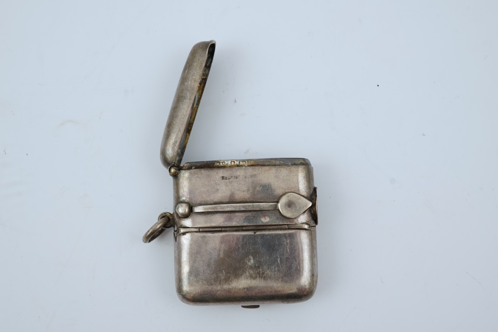 A late Victorian silver combination, cigar cutter, sovereign/half sovereign and vesta case by William Hair Haseler